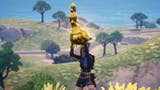 fortnite player holding golden chicken above their head