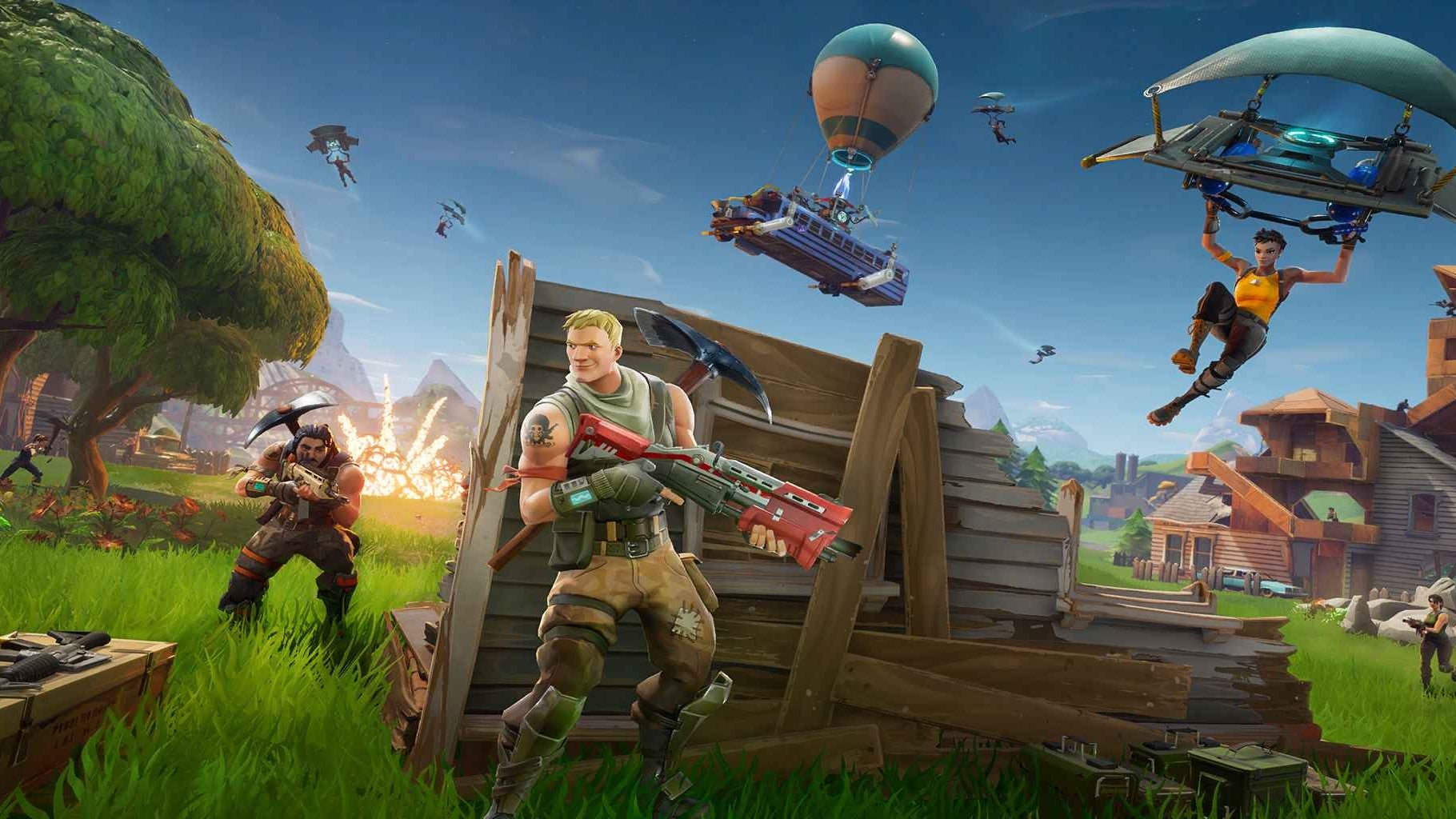 Fortnite loading screen showing battlefield chaos including gliders and guns