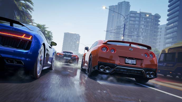 Forza Horizon 3 screenshot showing different coloured sports cars racing through a city