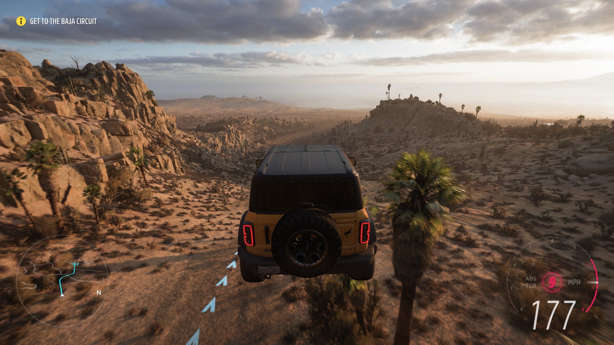 A jeep makes a huge jump in Forza Horizon 5. - 8