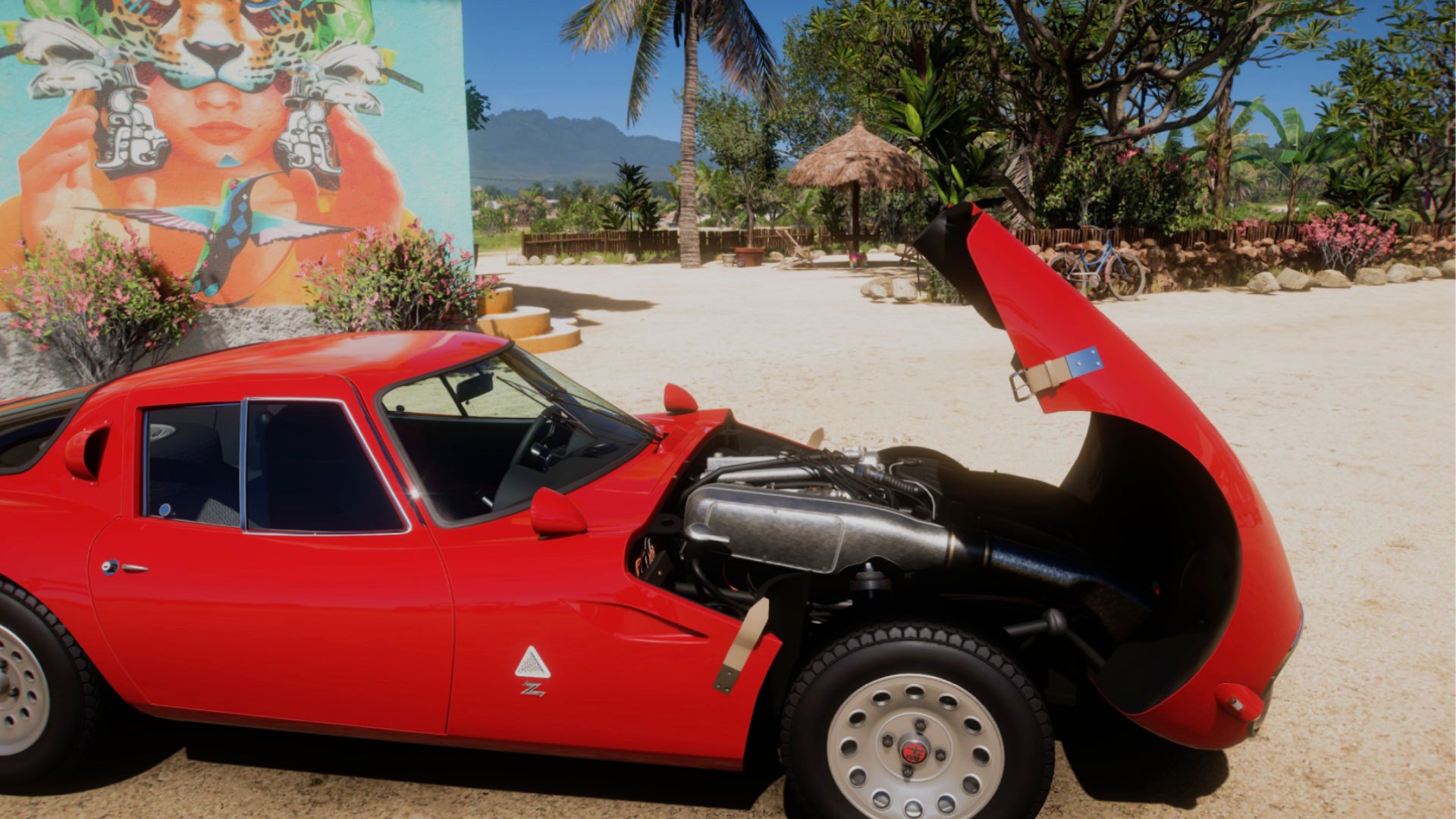 A classic Alfa Romeo with its bonnet up at Forza Horizon 5's beach house.