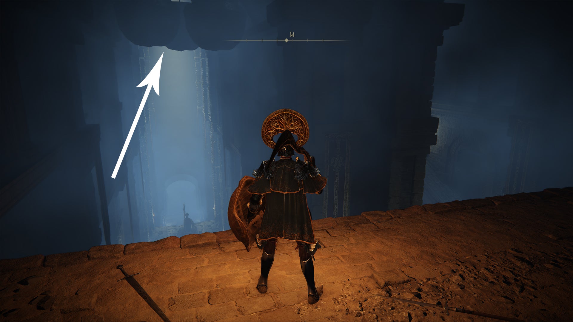 Explosive pots hanging from a ceiling inside the Fringefolk Hero’s Grave in Elden Ring. - 10