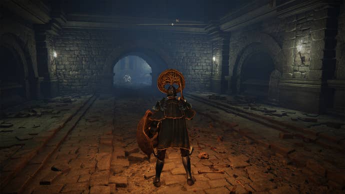 A spirit knight inside the Fringefolk Hero’s Grave in Elden Ring.