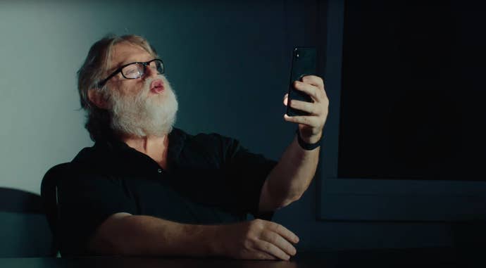 Gabe Newell takes a selfie successful an advert for a Dota 2 Cave Johnson announcer pack.