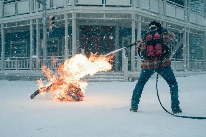 Tommy blasts an infected with fire in TLOU season two