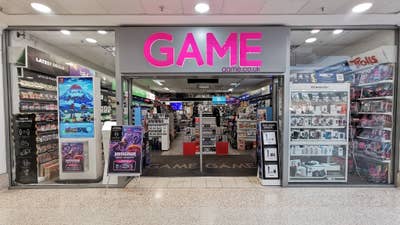 Picture of the front of a GAME store in a brightly lit mall