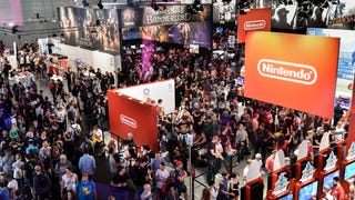 Crowds of people wandering around the halls of Gamescom.