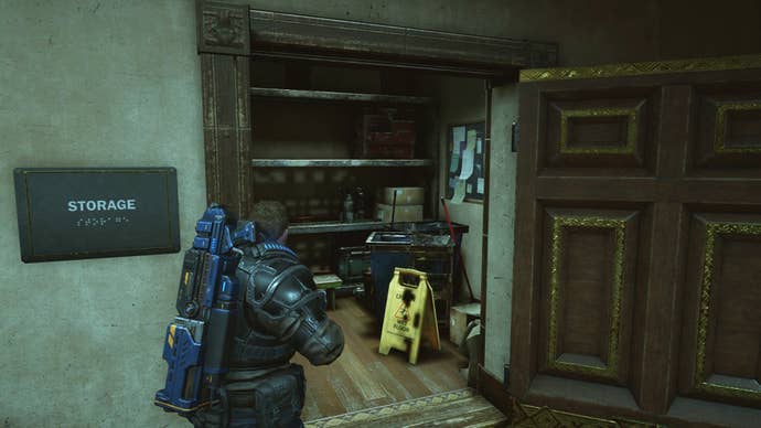 JD Fenix stood outside the storage room in Gears 5's theatre