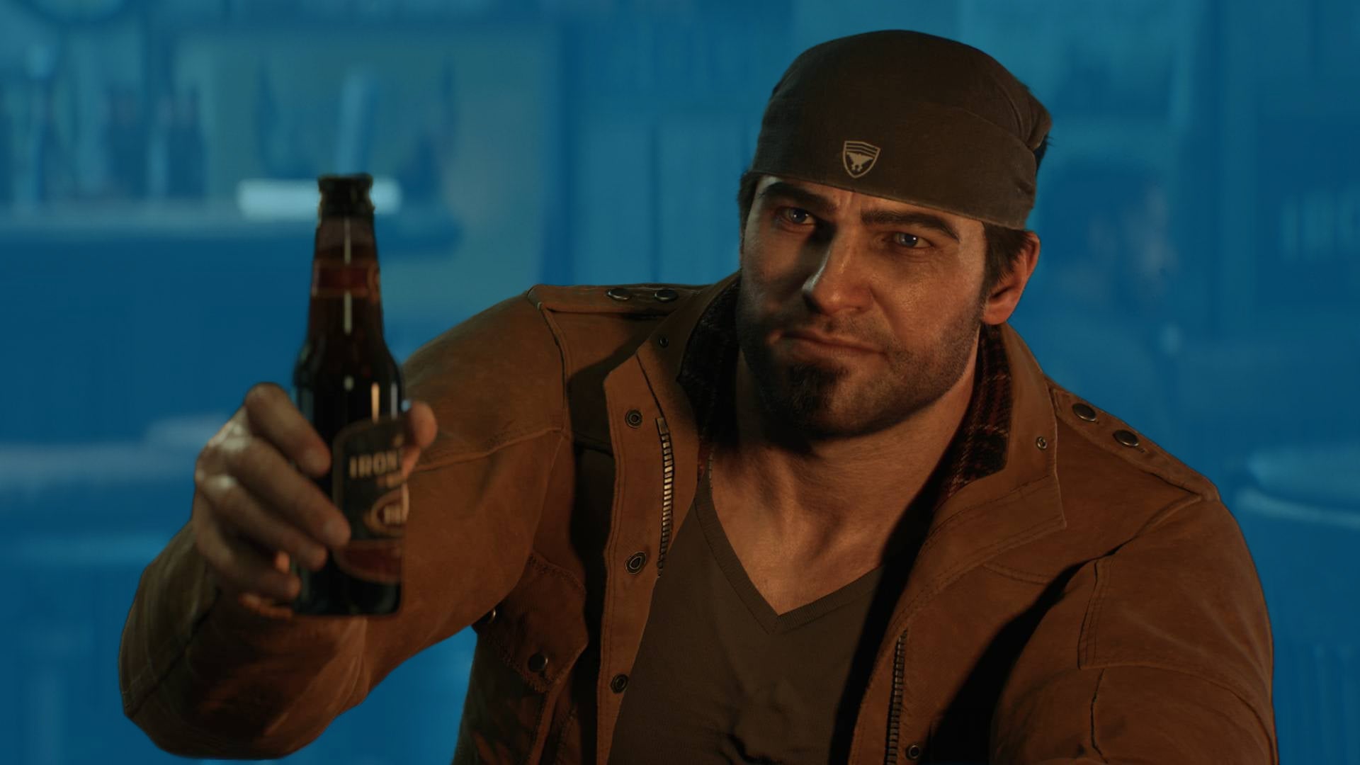 Marcus Fenix, as he appears in civilian clothes, holds a beer up to the viewer