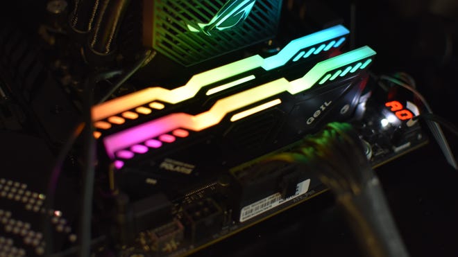 Two sticks of Geil RGB DDR5 RAM installed in a motherboard.