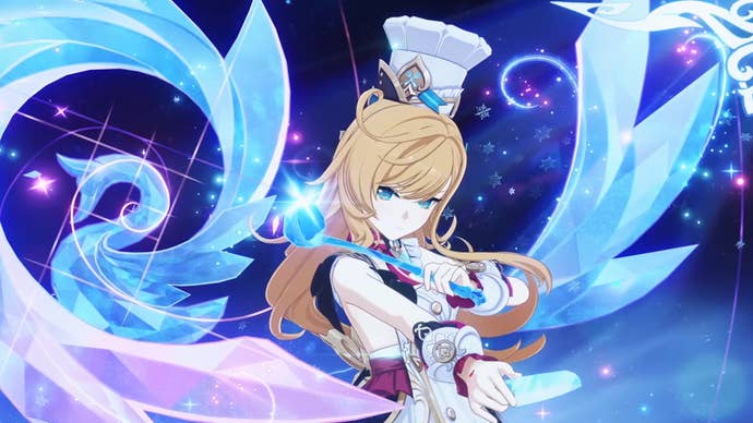 Escoffier poses next to an ice sculpture in the shape of a swan