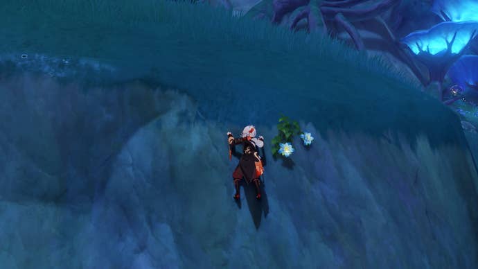 Genshin Impact Kalpalata Lotus locations: A young man is climbing a hill to harvest a Kalpalata Lotus