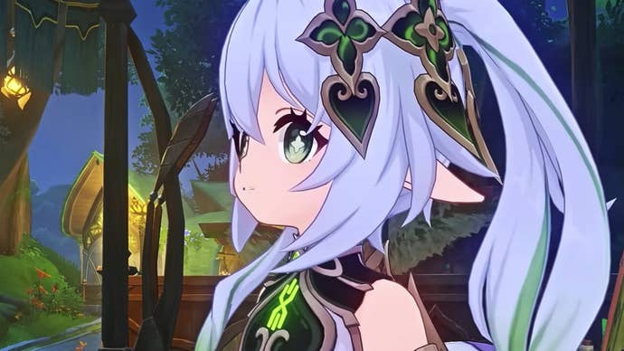Genshin Impact Nahida build: An anime girl in a green dress looks out into the night