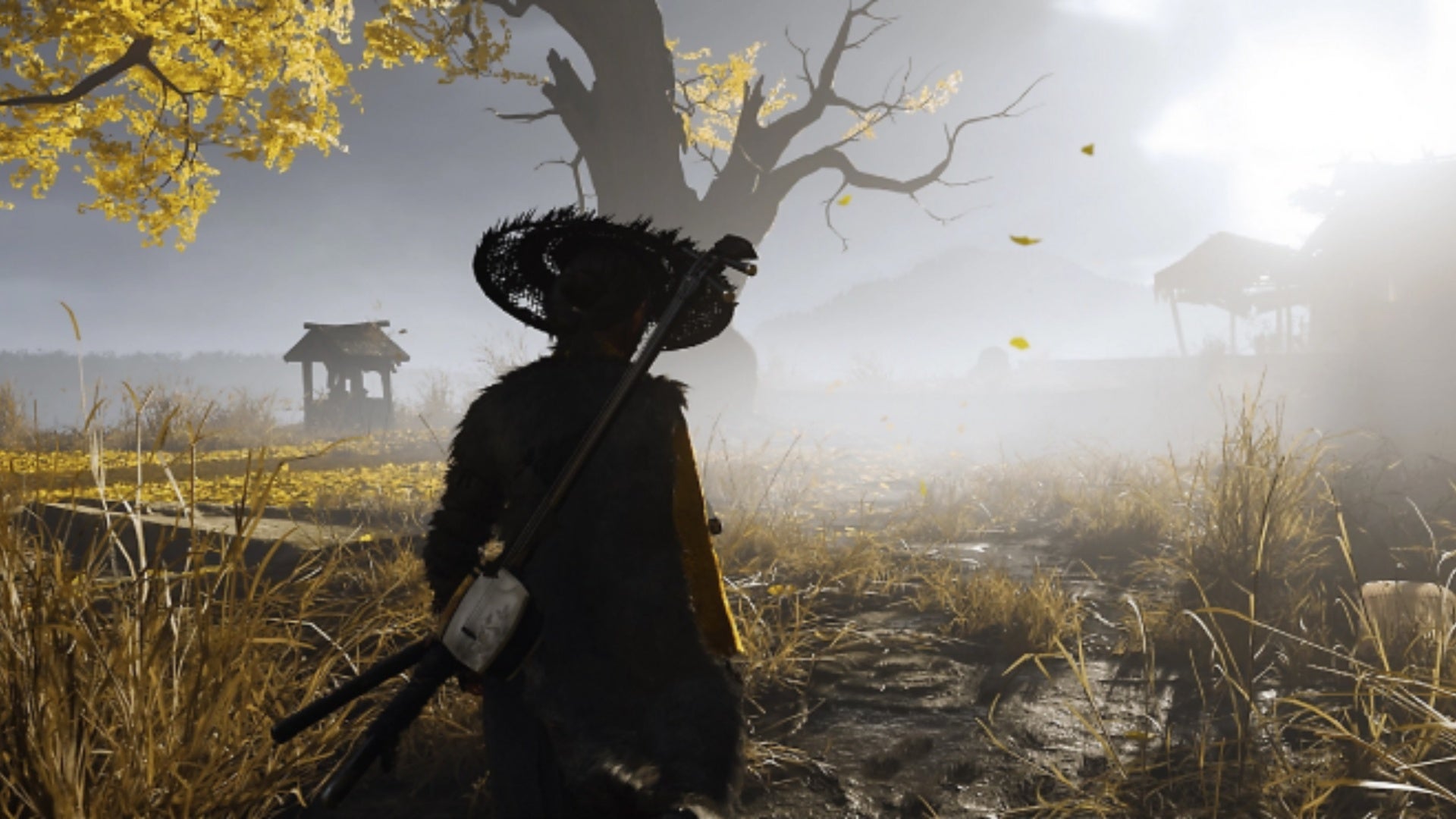 ghost of yotei character standing in field by leafy tree