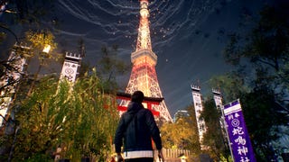 Akito admires the Tokyo Tower from ground level in a promotional image for Ghostwire: Tokyo.