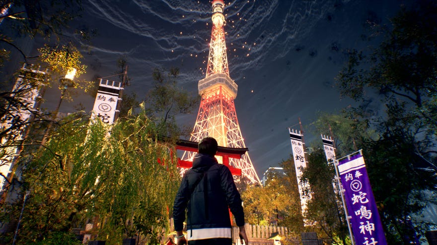 Akito admires the Tokyo Tower from ground level in a promotional image for Ghostwire: Tokyo.