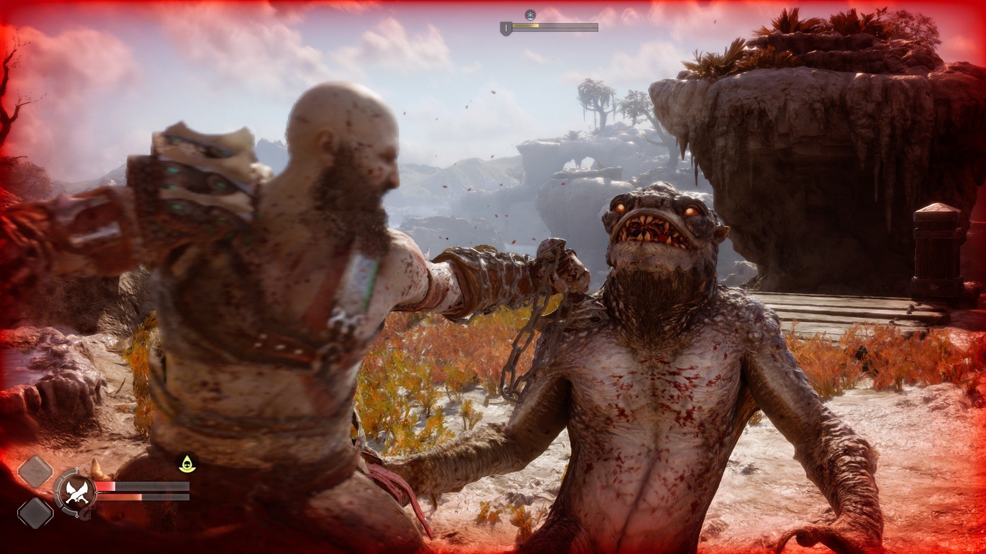 Kratos punches a monster in God Of War Ragnarok. - 4