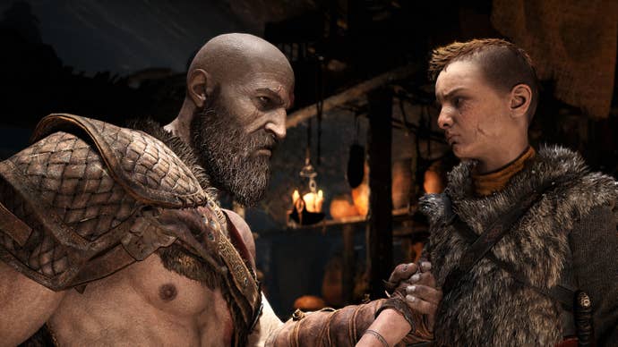 Kratos holds his son’s arm in a screenshot from God of War’s PC edition.