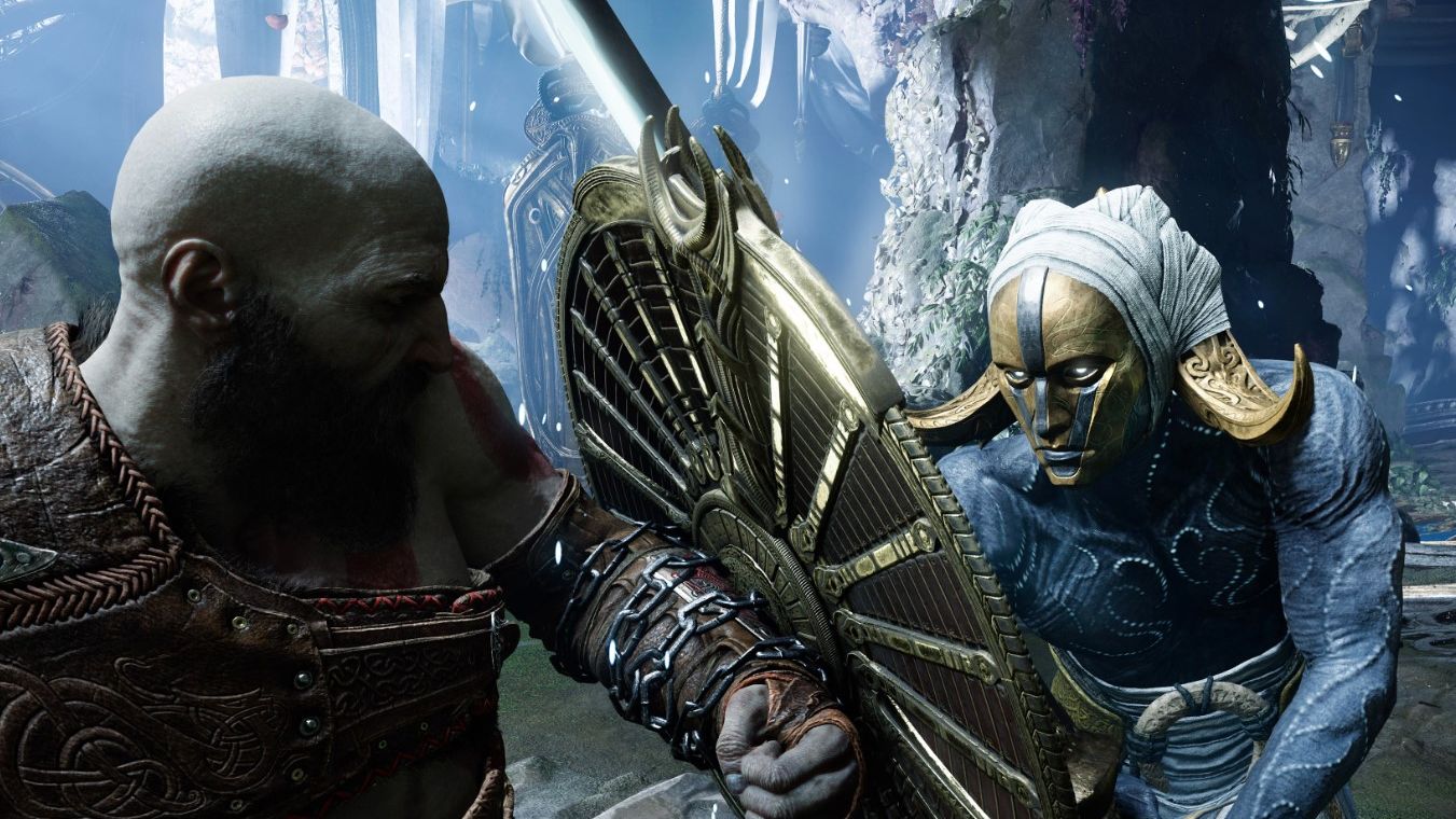 Kratos brings up his shield to block an attack from a horned enemy in God Of War Ragnarök - 1