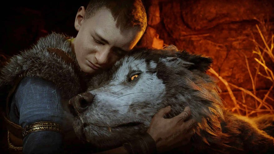 Atreus holds a dying wolf’s head in his arms.