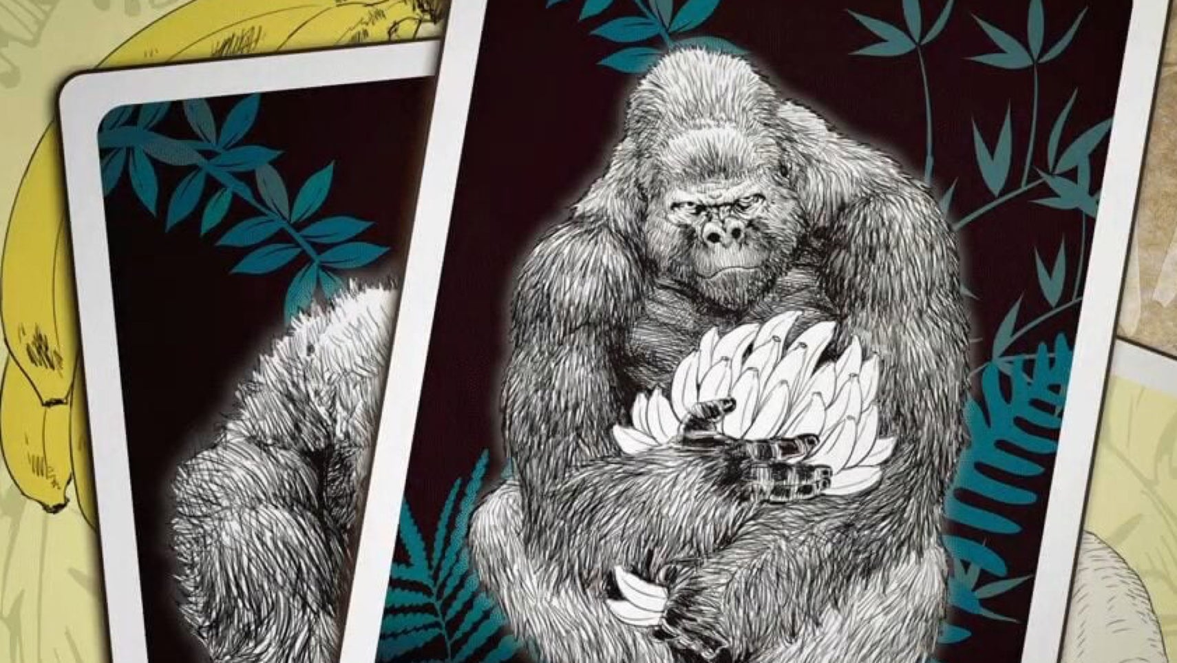 Goritaire artwork showing cards featuring images of gorillas holding massive bunches of bananas.