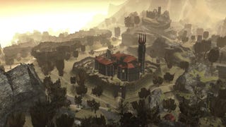 An aerial shot of the world of Gothic sprawling into the distance through an early morning mist.