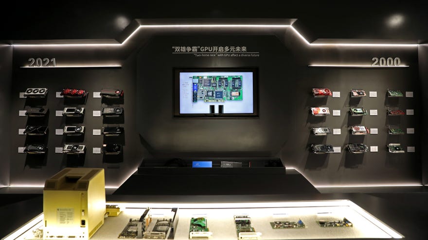 A photo of the GPU History Museum with graphics cards on the wall.
