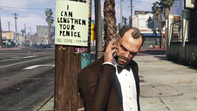 Trevor on the phone beneath a flier advertising to ‘lengthen your penice’ in a Grand Theft Auto 5 screenshot.