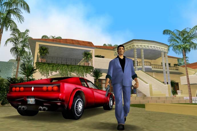 A screenshot of GTA: Vice City in which the game’s protagonist is walking next to a fancy car, in front of a fancy house.