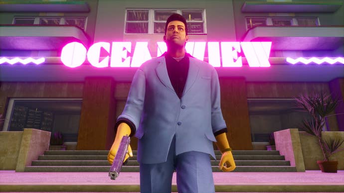 A happy crime man walks out of a hotel in Grand Theft Auto Vice City Definitive Edition.