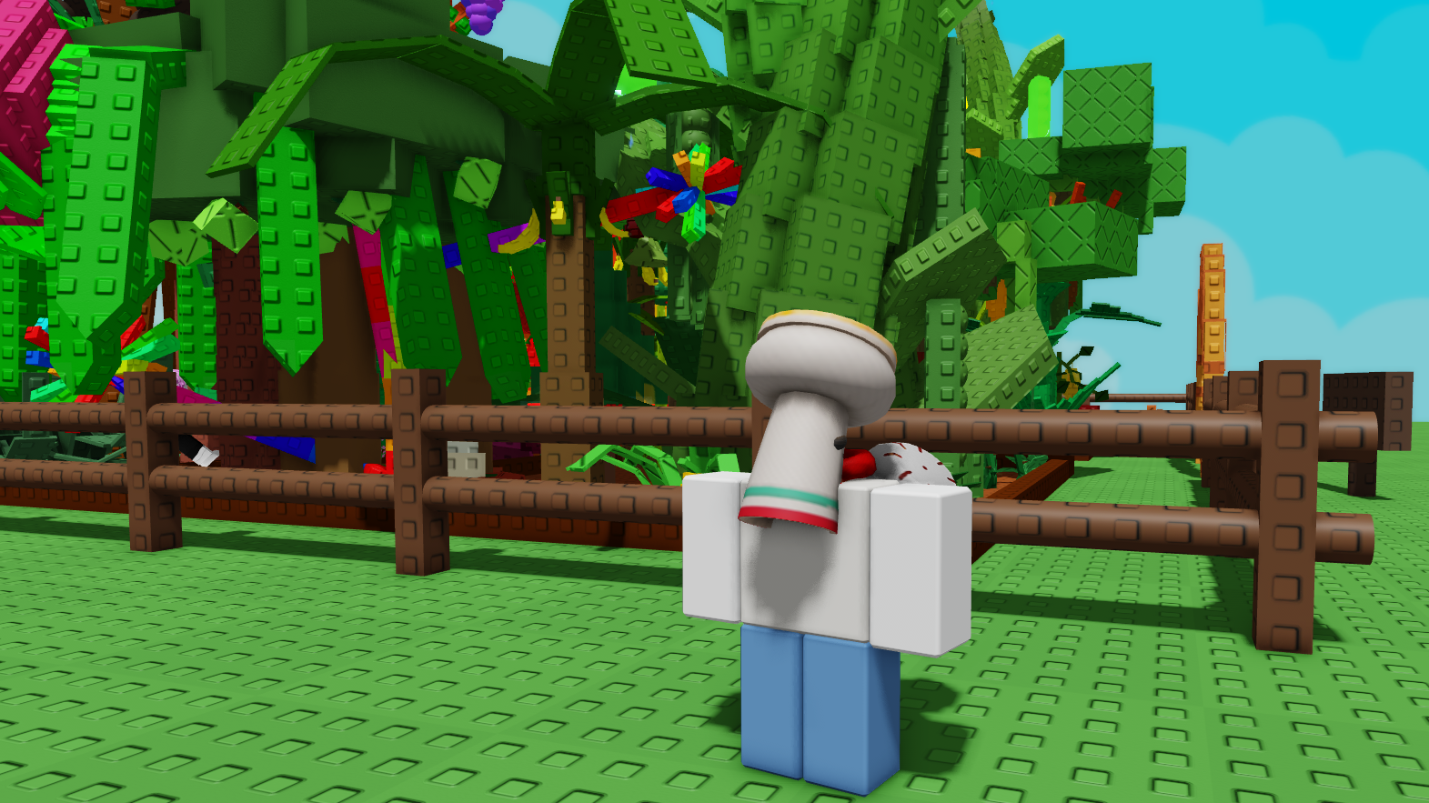 A player standing in front of a thriving garden in Grow a Garden. - 1