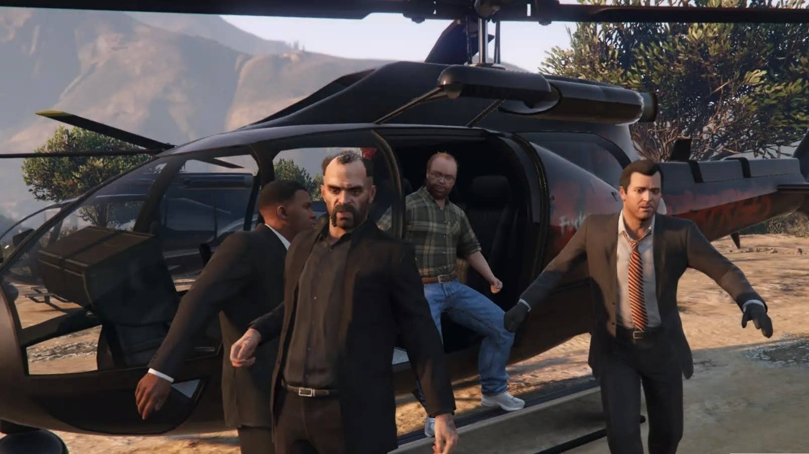 The three leads of GTA 5 and Lester emerge from a helicopter.