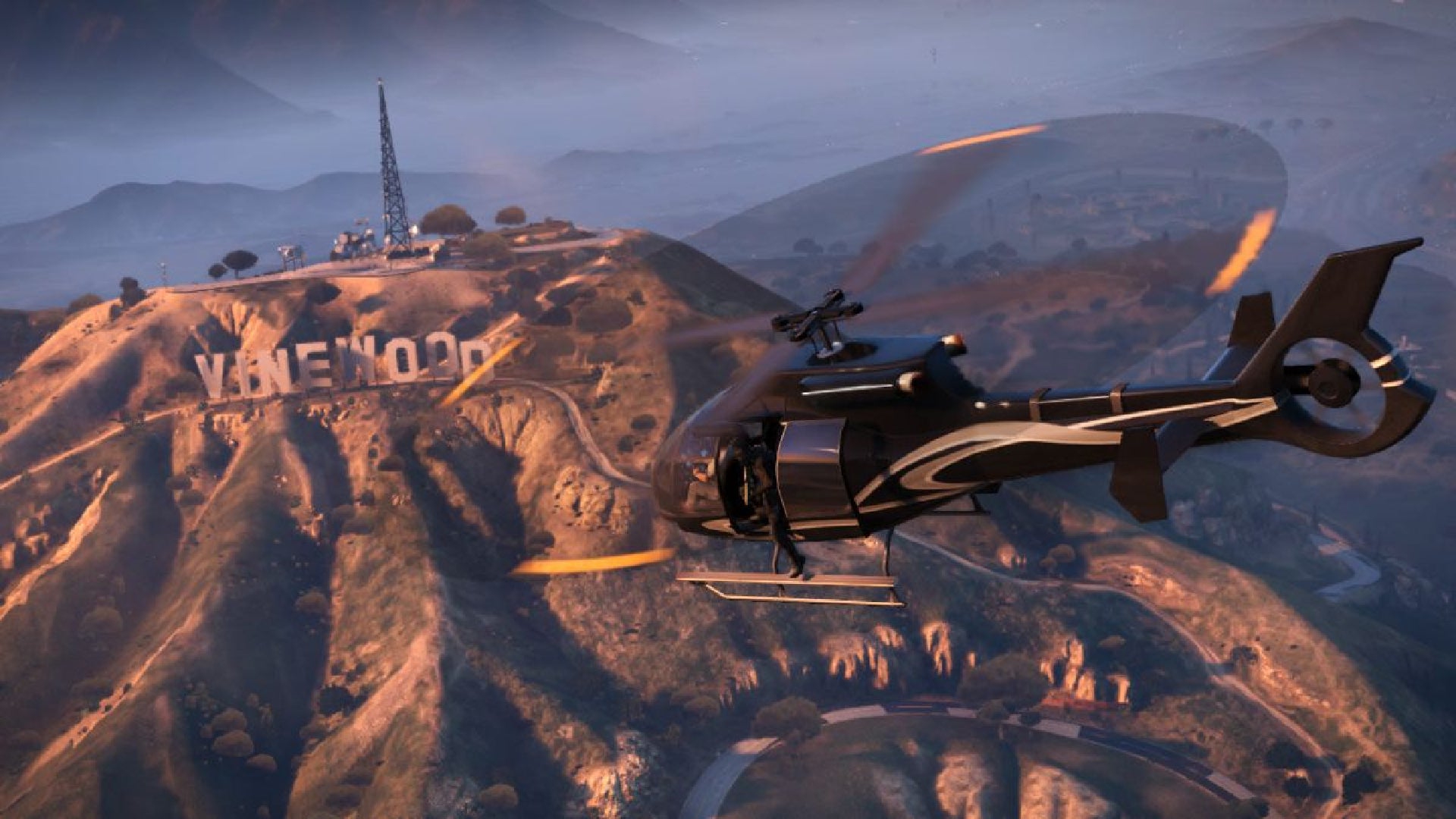 A helicopter flying near the Vinewood sign in GTA 5. - 1