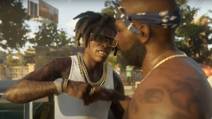 Two characters wearing gold chains bump fists in the GTA 6 trailer.