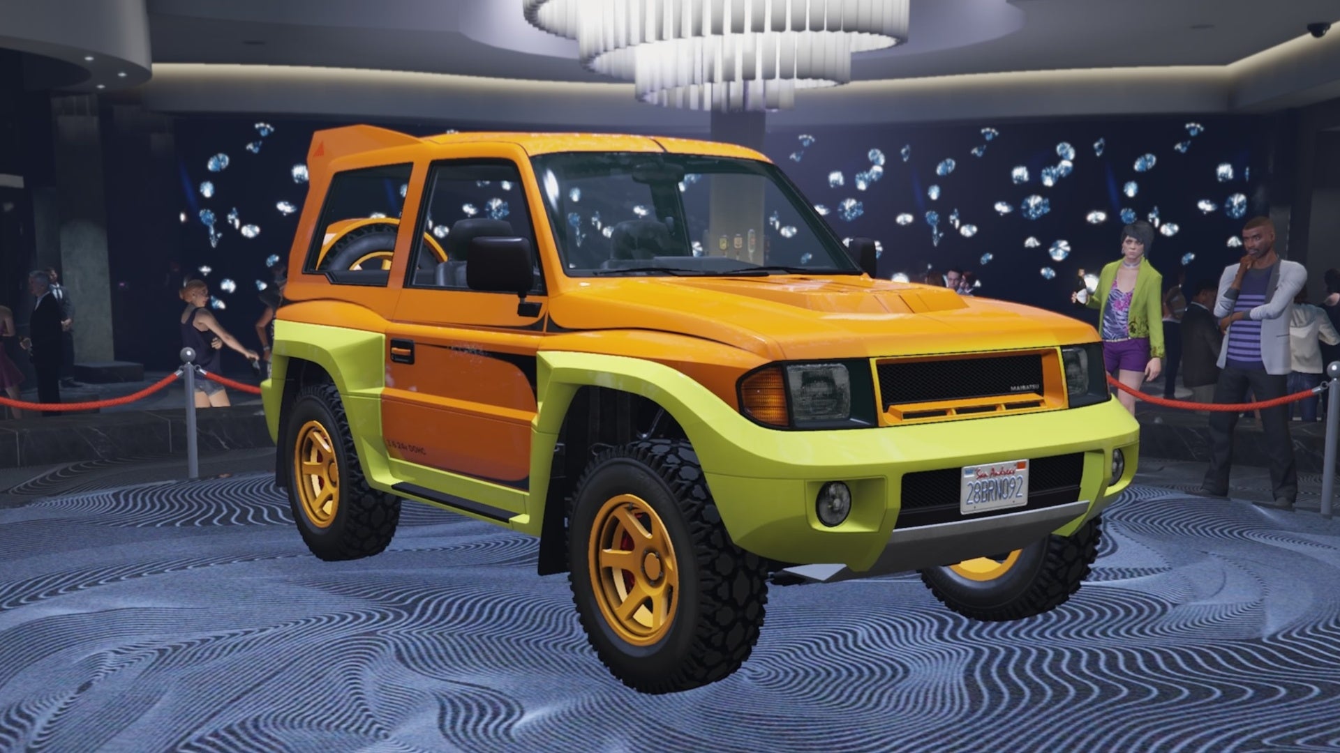 GTA Online Podium Vehicle For This Week Including How To Use The Lucky Gta Online Yellow And Orange Maibatsu Monstrociti Diamond Casino Podium Side Angle View 