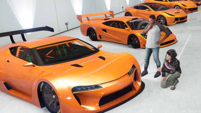 GTA Plus, official Rockstar image of several orange cars in the new multi floor garage.