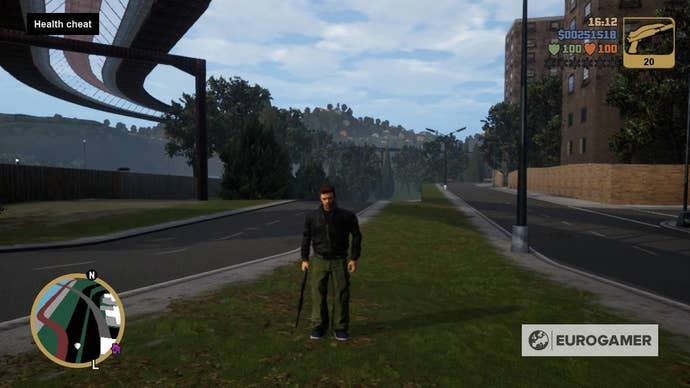 Claude Speed standing on some grass holding a rifle