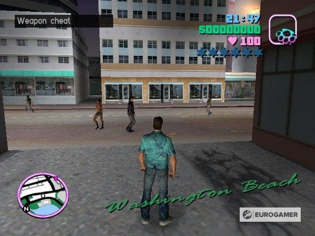 GTA Vice City's Tommy Vercetti stood in Washington Beach having just activated a weapon cheat