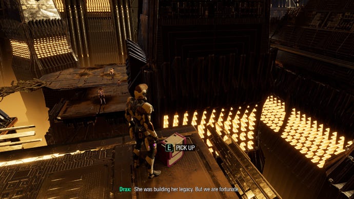 Star-Lord stands by outfit box on raised platform whilst other Guardians of the Galaxy stare at him from below