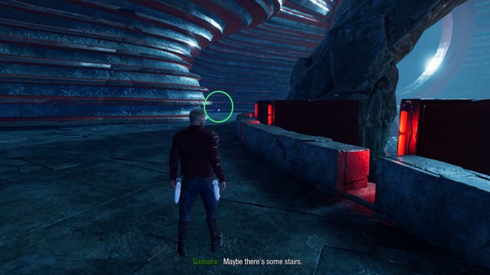 Star-Lord standing at edge of Hellbender’s throne room, pink outfit box up ahead