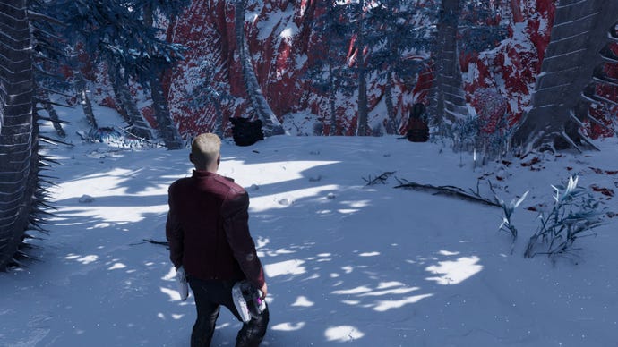 Star-Lord stands in snow with debris nearby