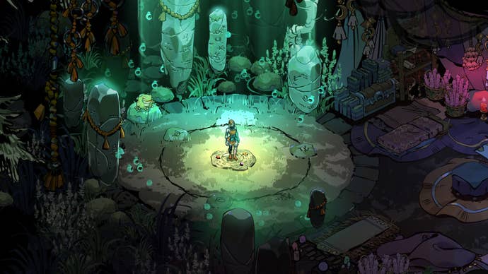 Hades 2’s protagonist Melinoë stands in the centre of the screen in a shaft of yellow-green light. Around the edges of the circular arena in which she stands are stones with runic carvings, a number of tiny spectral figures, and a very large frog.