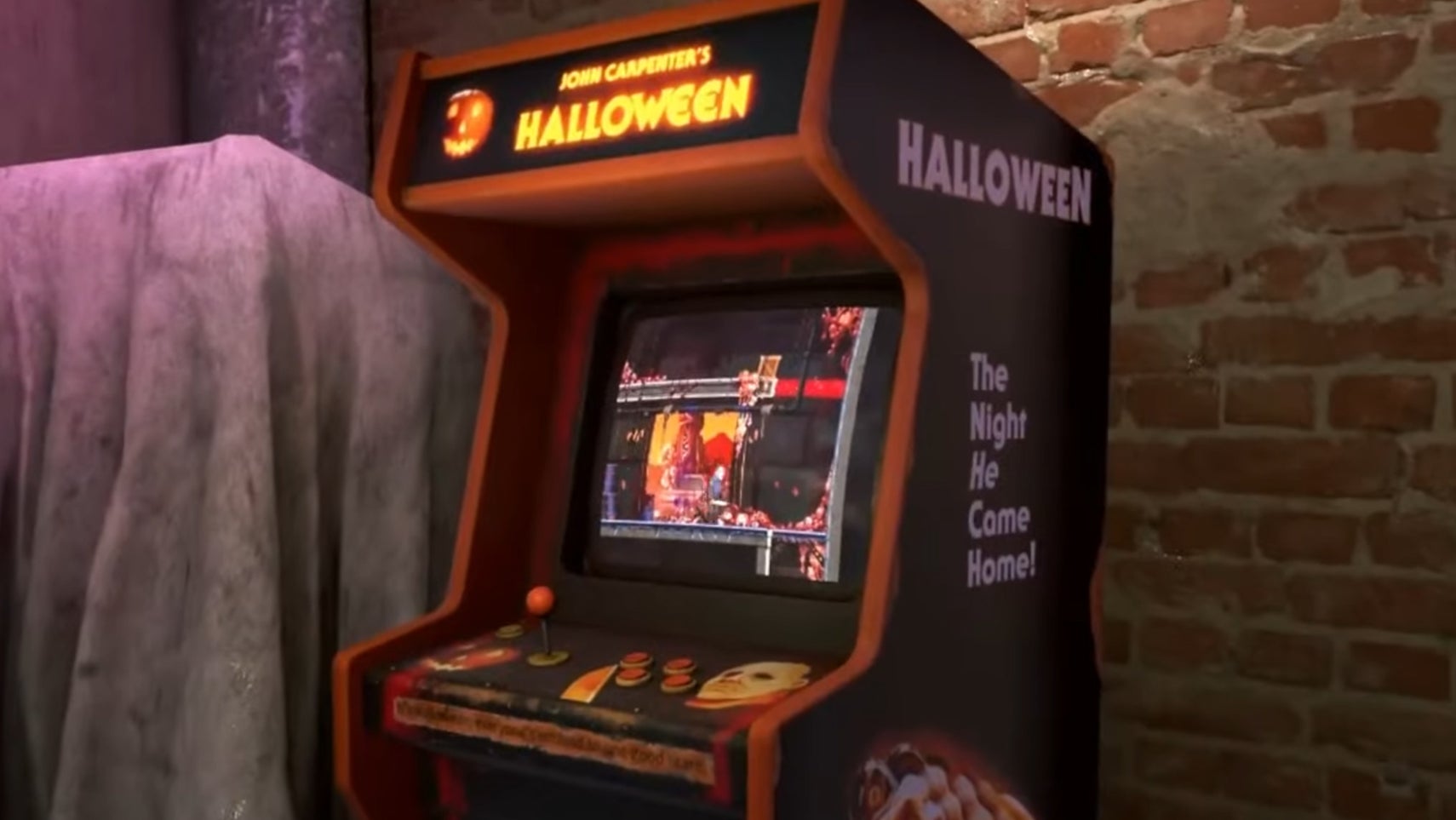 An arcade cabinet with a pixel-art Halloween game on it. - 1