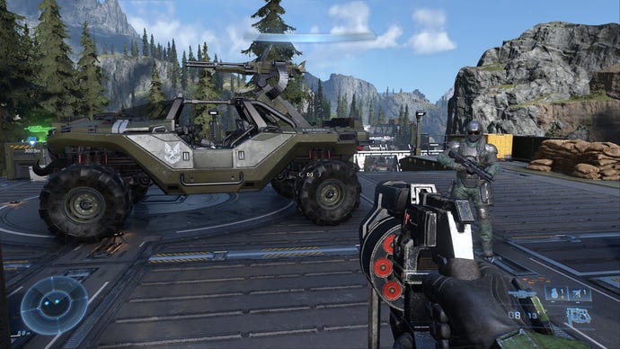 A Warthog is parked at a forested space base in Halo Infinite