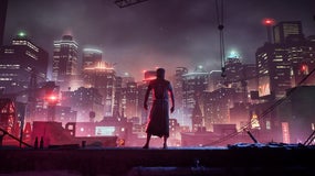 A figure dramatically silhouetted against a skyline full of glowing city buildings in Vampire: The Masquerade - Bloodlines 2.