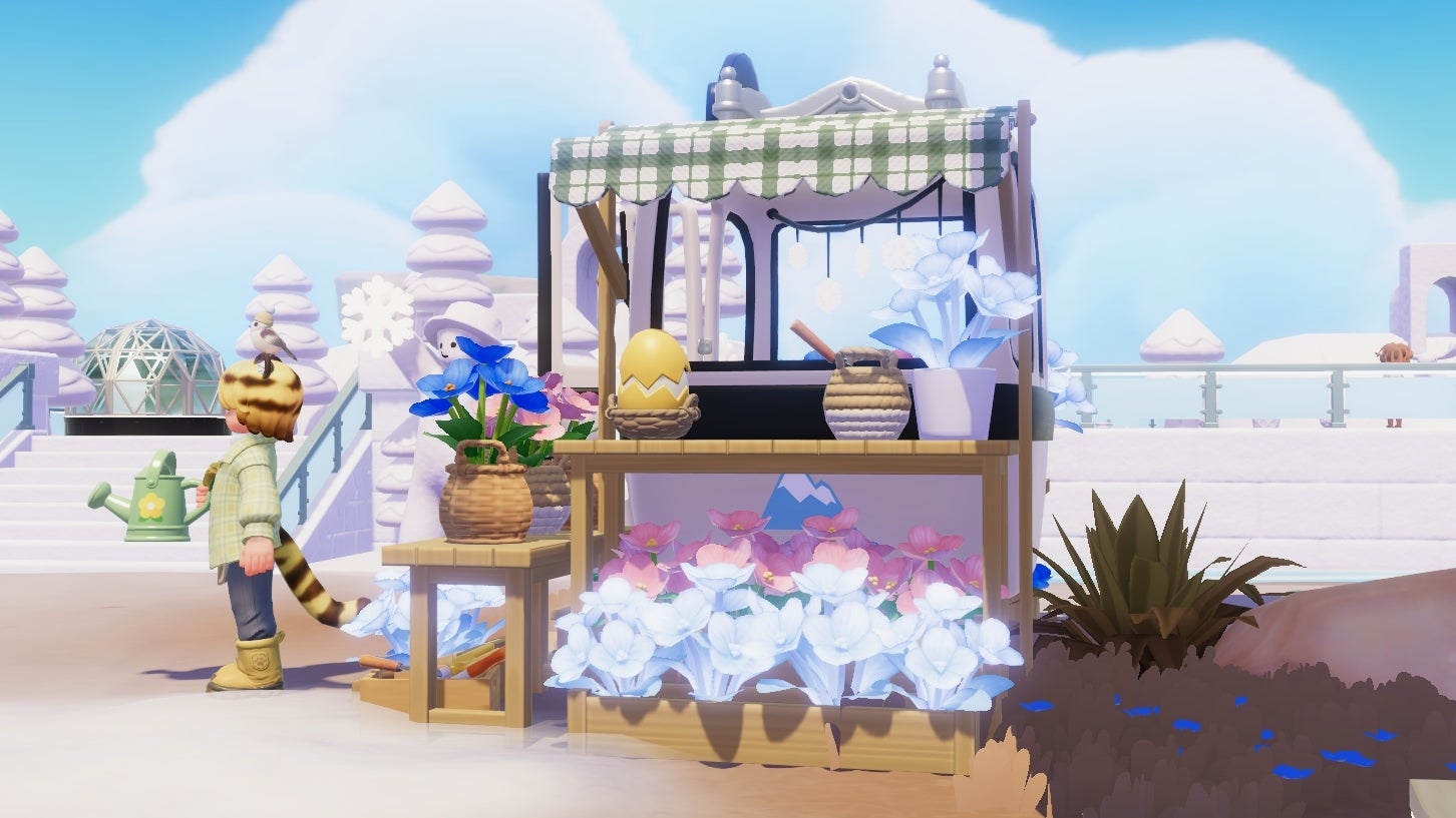 Blanc (the catboy gardener from Heartopia) stands facing away from his mobile gardening shop in front of an ice rink arena. Among his flower displays on an affixed shelf is a yellow egg in a basket. - 13