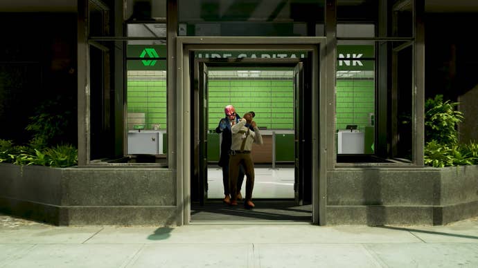 Payday 3 heister, wearing a clown mask, holds a bank security guard at gun point