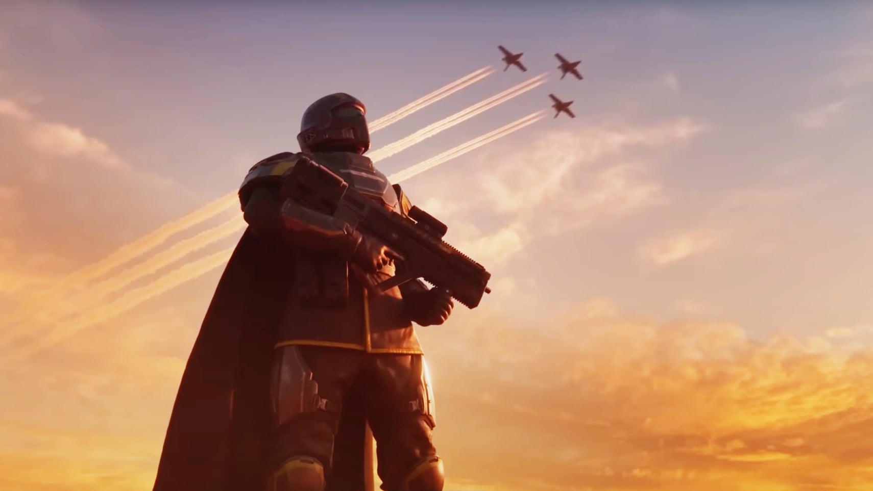 A Helldiver standing proudly has jets fly overhead in Helldivers 2. - 1