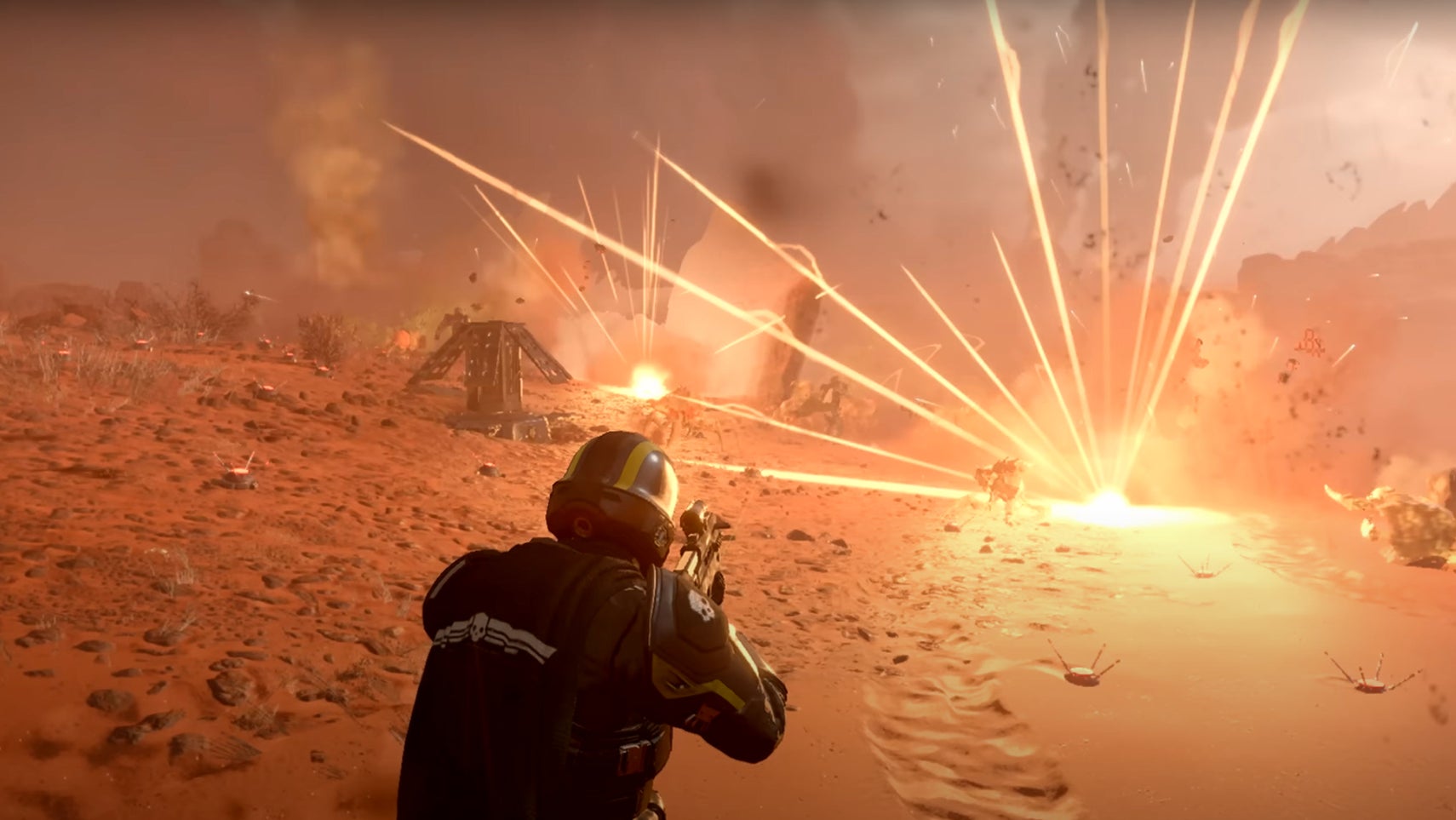 A player surrounded by explosions in Helldivers 2. - 1