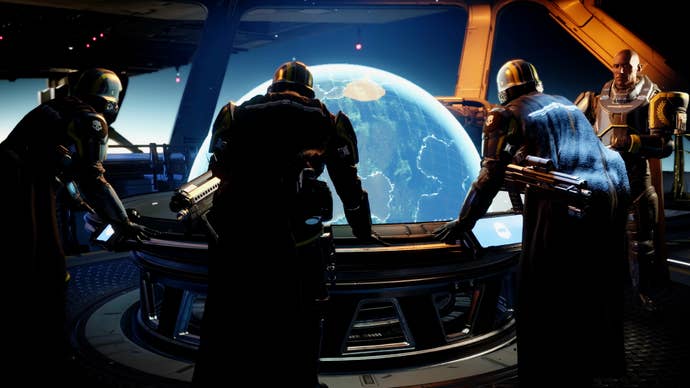 Some Helldivers 2 players gathered around the Galactic War table.